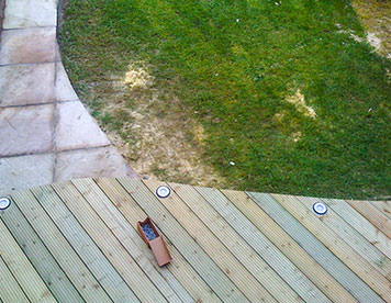 Curved edge decking with uplighters